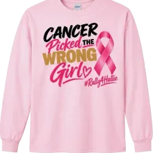 A pink long sleeve t-shirt printed with the same design as the short sleeve tee: "CANCER Picked THE WRONG Girl" in black, pink and gold lettering, next to a pink ribbon, with "#Rally4Hallie" written below in pink script.